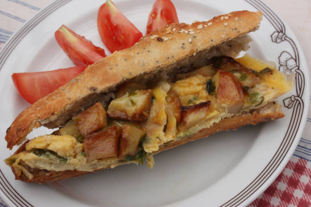 istock Baguette sandwich with omelette with potatoes and cheese 1142596630