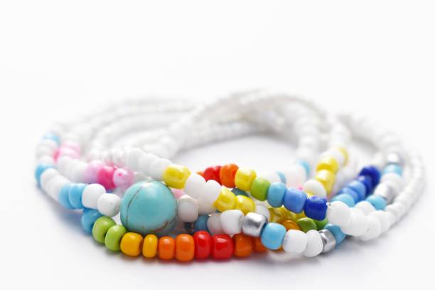 istock Glass Beads Bracelet Rainbow on White Background 1142601106
