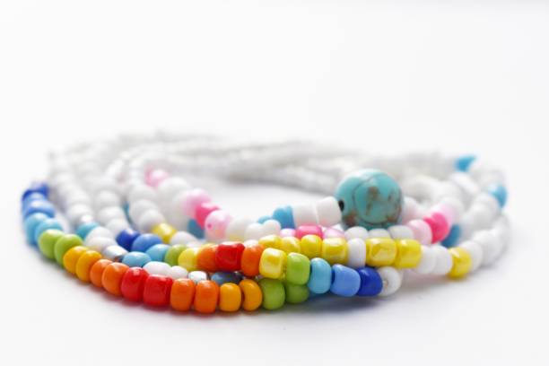 istock Glass Beads Bracelet Rainbow on White Background 1142601108