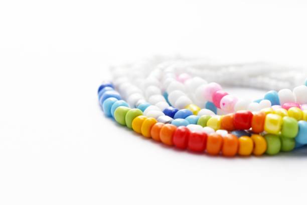 istock Glass Beads Bracelet Rainbow on White Background 1142601145