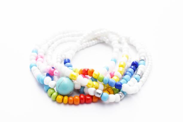 istock Glass Beads Bracelet Rainbow on White Background 1142601180