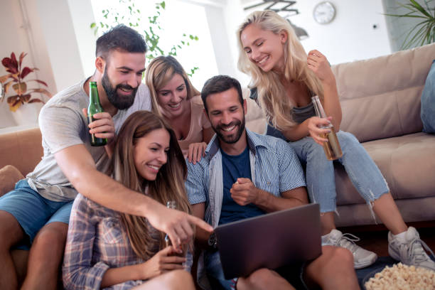 istock Friends enjoying together at home 1142601472