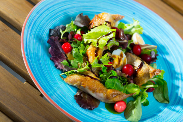 istock Salad with quail, berries and sauce 1142610812