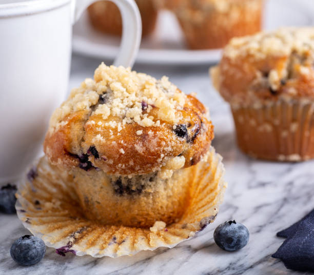 istock Blueberry Muffins with Fresh Berries 1142611739