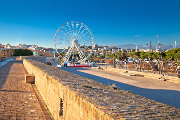 istock Giant Ferris wheel in Antibes colorful view 1142613290
