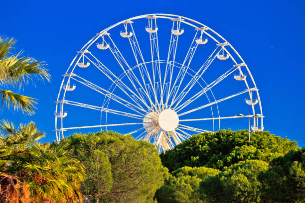 istock Giant Ferris wheel in Antibes colorful view 1142613348