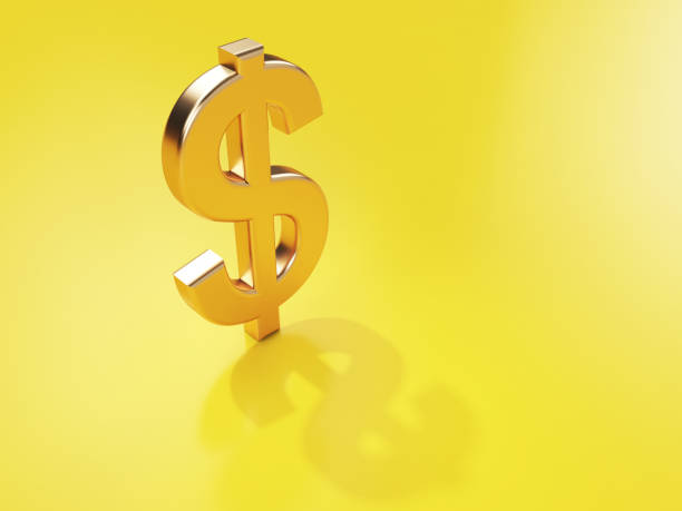 istock Golden Dollar Sign On Yellow Background Focused Image 1142613538