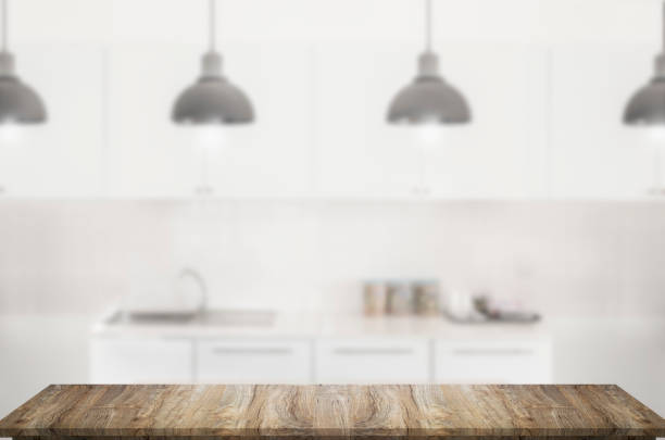 istock Empty wooden top table in kitchen room. 1142615435