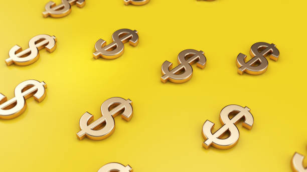 istock Golden Dollar Sign On Yellow Background Focused Image 1142615497