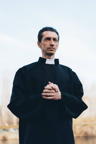 istock Portrait of handsome catholic priest or pastor with collar 1142616911