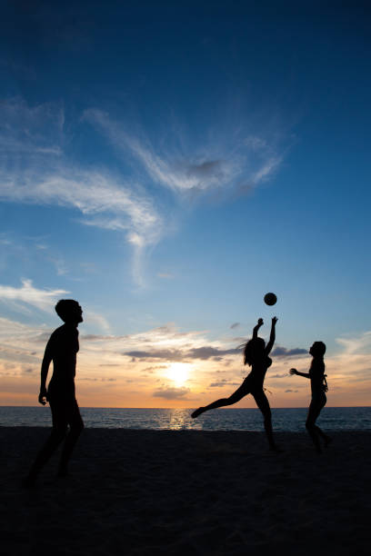 istock People playing volleyball 1142618222