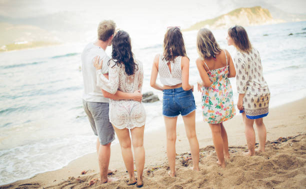 istock Group of friends on the beach 1142620531