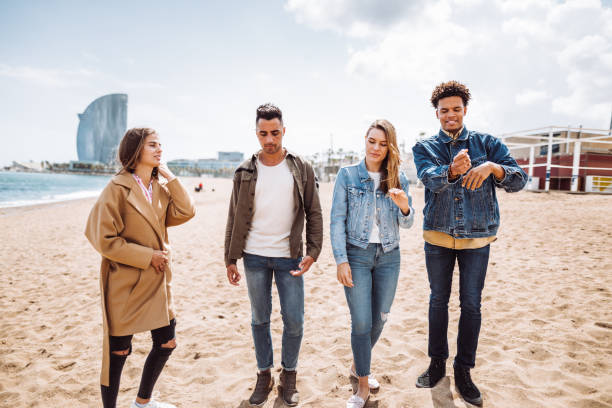 istock friends walking together in Barceloneta 1142621202