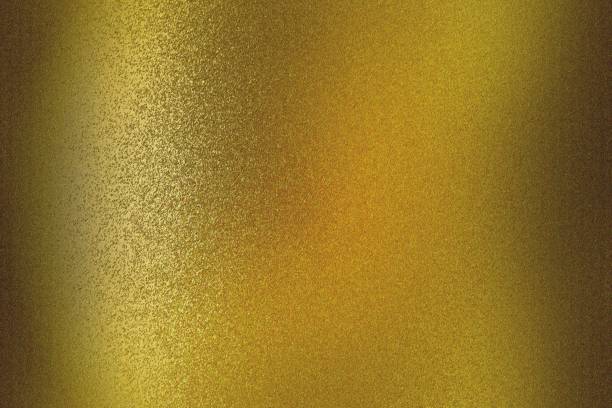 istock Abstract texture background, light shining on rough bronze metal wall 1142623570