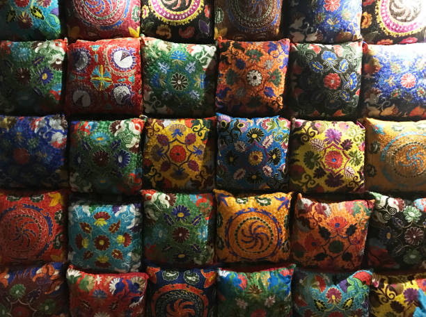 istock Asian floral textile pattern on pillows. Traditional colorful hand made patchwork for decoration 1142625284