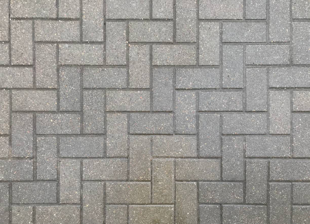 grey pavement texture - sidewalk brick street footpath imagens e fotografias de stock