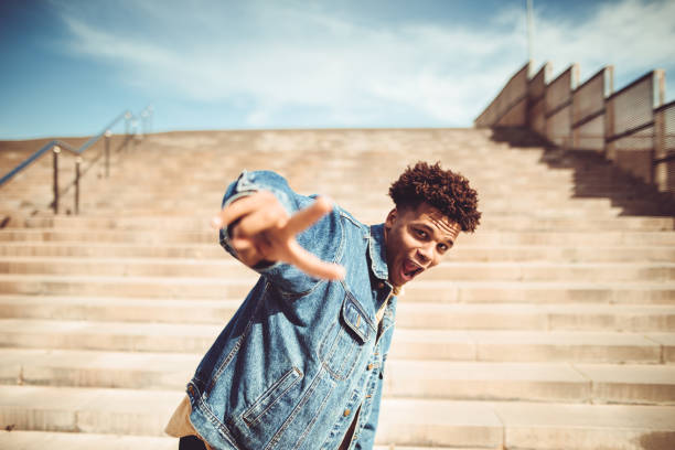 funky man portrait gesturing in the city