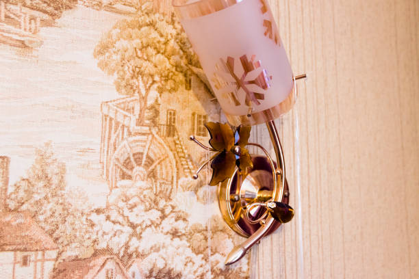 pictured in the photo vintage wall lamp beautifol decorated with plastic bow tie