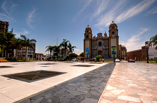 New Chimbote, Peru - April 16, 2018: View across square of San Pedro Cathedral in New Chimbote Peru