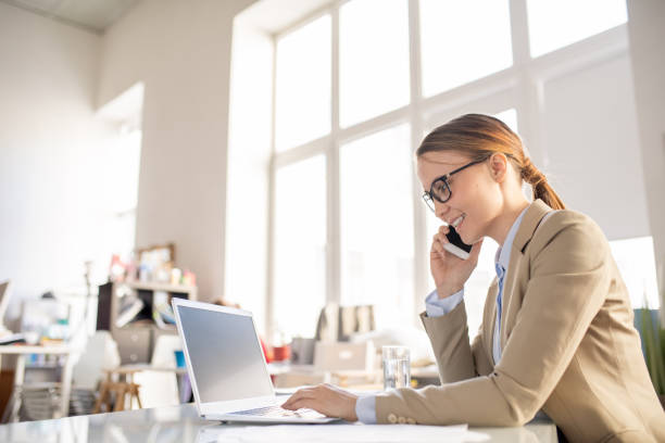 istock Communicative businesswoman working with customer 1142632583