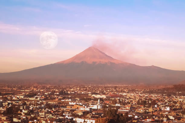 View of the active volcano Popocatepetl. Mexico. Cholula. Puebla. View of the active volcano Popocatepetl. Mexico. Cholula. Puebla. popocatepetl volcano photos stock pictures, royalty-free photos & images