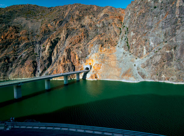 istock Dam lake, tunnel and bridge 1142634518