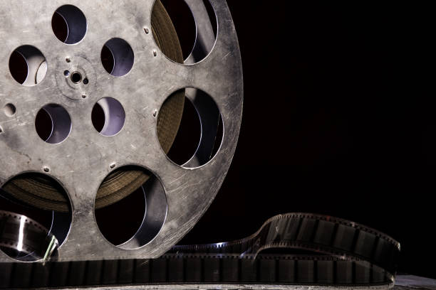 istock 35 mm film reel with dramatic lighting on a dark background 1142636119