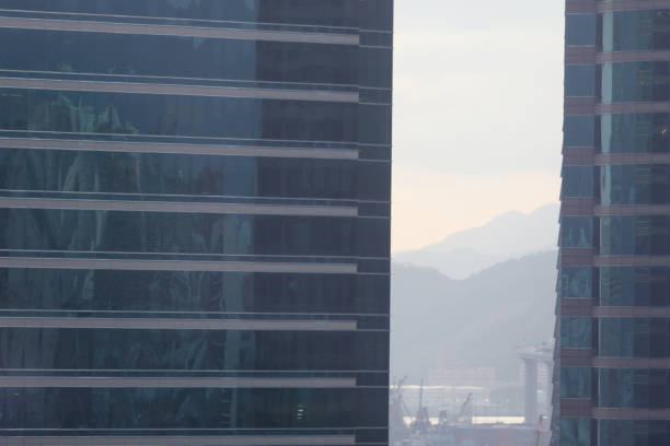 istock a glass grey square Windows of modern city 1142636124