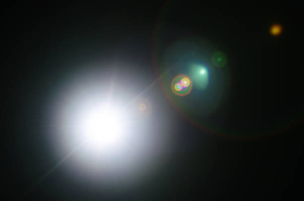 istock Abstract Natural Sun flare or Far star on the black background 1142636278