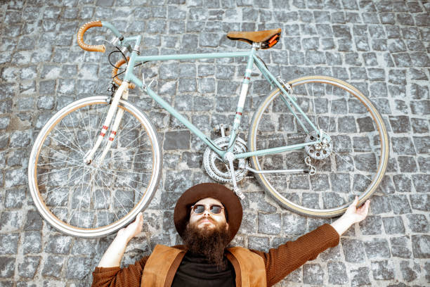 istock Stylish man with retro bicycle 1142637509