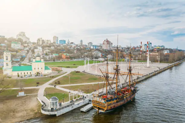Linear ship Goto Predestination on Admiralty Square at embankment of Voronezh river - popular tourist place in Voronezh city, Russia, aerial view.