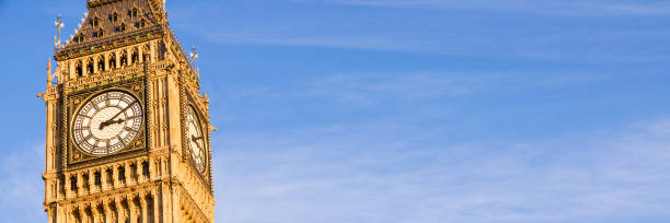 istock Big Ben close up, London, UK. Blue sky panoramic background 1142640311