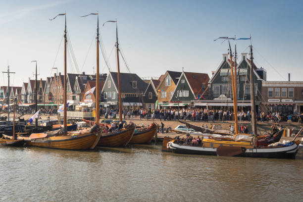 Volendam harbour and historic flat bottom ships called botters. Ships participating in the annual Pieper Race stock photo