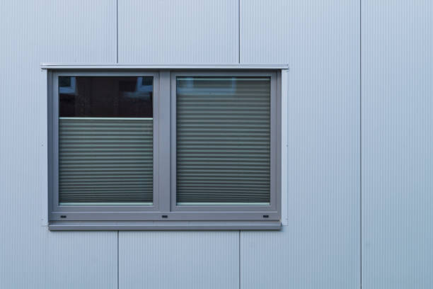 istock Facade of an office building with a window. 1142641198