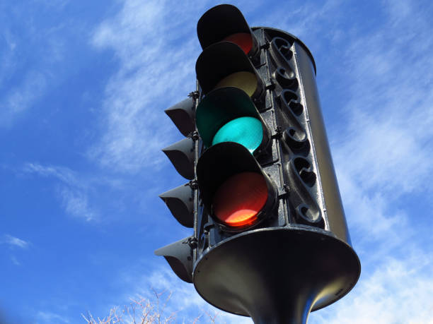 istock Vintage Style Traffic Lights and Blue Sky 1142643962