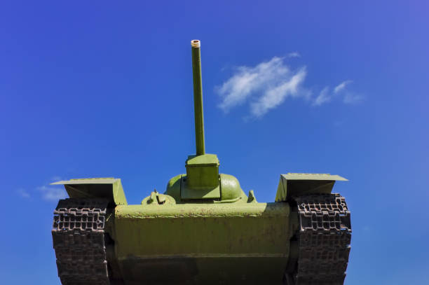 istock Soviet tank T-34 at war in the second world war on a blue sky background. 1142644341