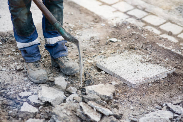 istock worker removing the rubble with a shovel 1142650372