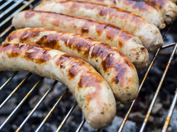 istock German Rostbratwurst on the grill 1142650476