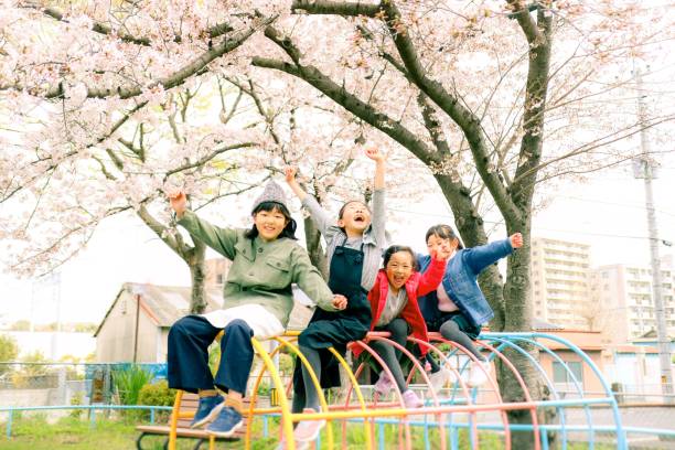 Japanese girls is playing at the park Two sisters which is cousin is playing together child japanese culture japan asian ethnicity stock pictures, royalty-free photos & images