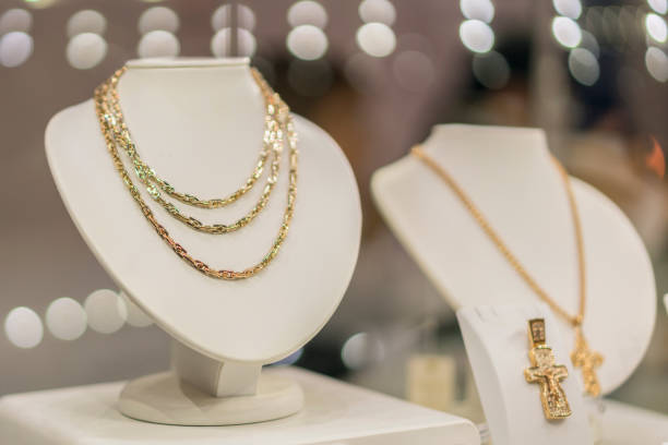 istock Gold necklace on the showcase 1142653286