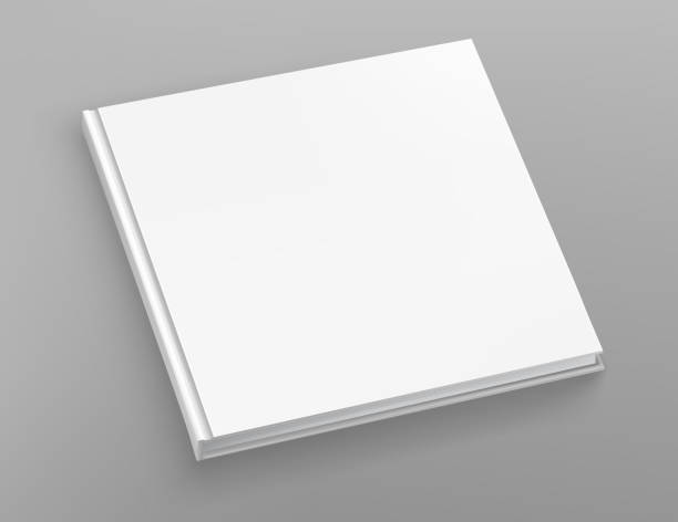 istock White hardcover scuare book album vector mock up on grey table.  Closed book top view vector illustration 1142653529
