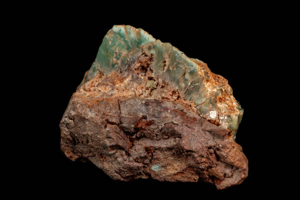 istock Macro of a stone Chrysoprase mineral on a black background 1142654065