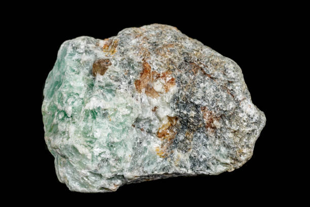 istock Macro of a stone Talc mineral on a black background 1142654655