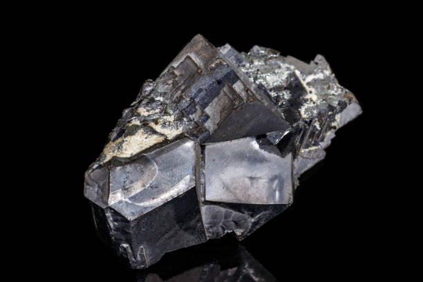 istock Macro stone mineral Galena on a black background 1142654879