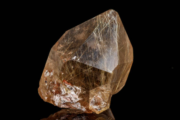 istock Macro stone mineral Rutile in quartz on a black background 1142654957