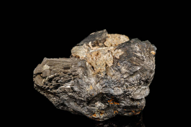 istock Macro stone Pyrite mineral with fluorite on a black background 1142655024