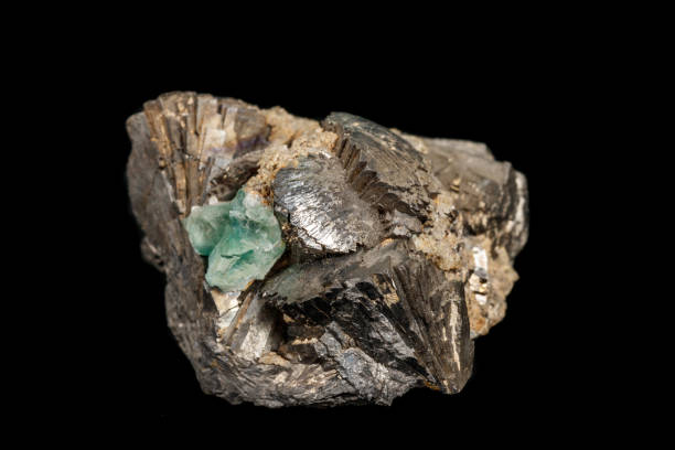 istock Macro stone Pyrite mineral with fluorite on a black background 1142655041