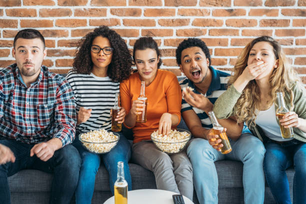 istock Group of friends watching tv 1142655343