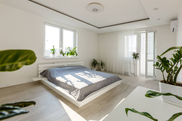 rest, interior, comfort and bedding concept - bed at home bedroom