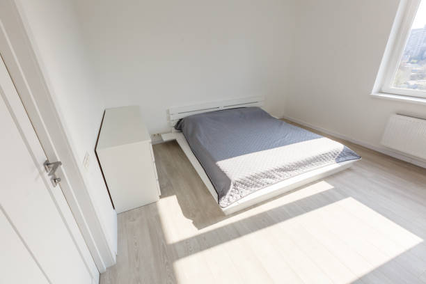 istock nice apartment refitted, bedroom with a double bed and lamps 1142657227